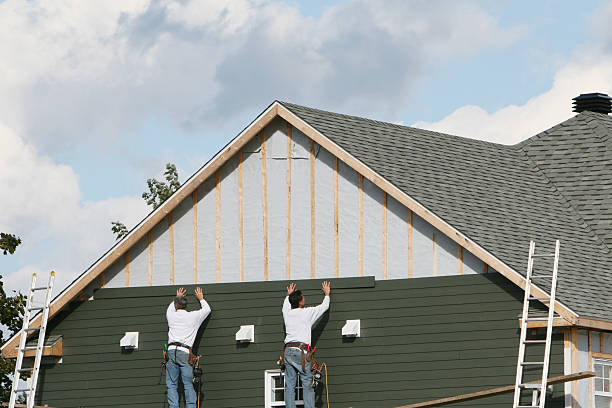 Professional Wood Siding technician working in Dedham, MA
